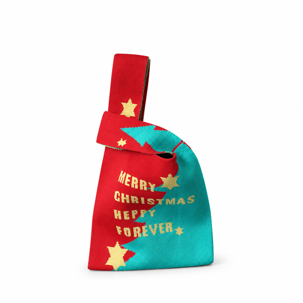 Red and turquoise knit knot-handle bag with Christmas tree and star motifs on a white background.