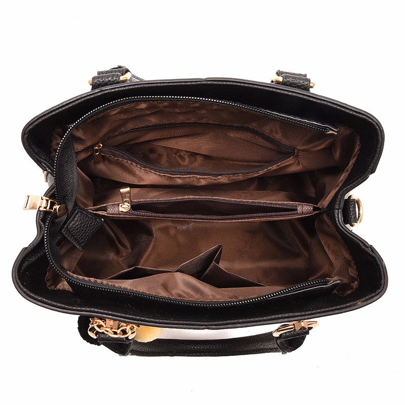 Quilted Top-Handle Bag in black, interior compartments