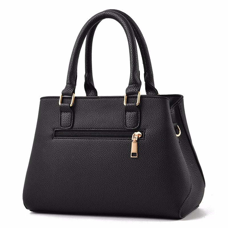 Quilted Top-Handle Bag in black, rear zip pocket